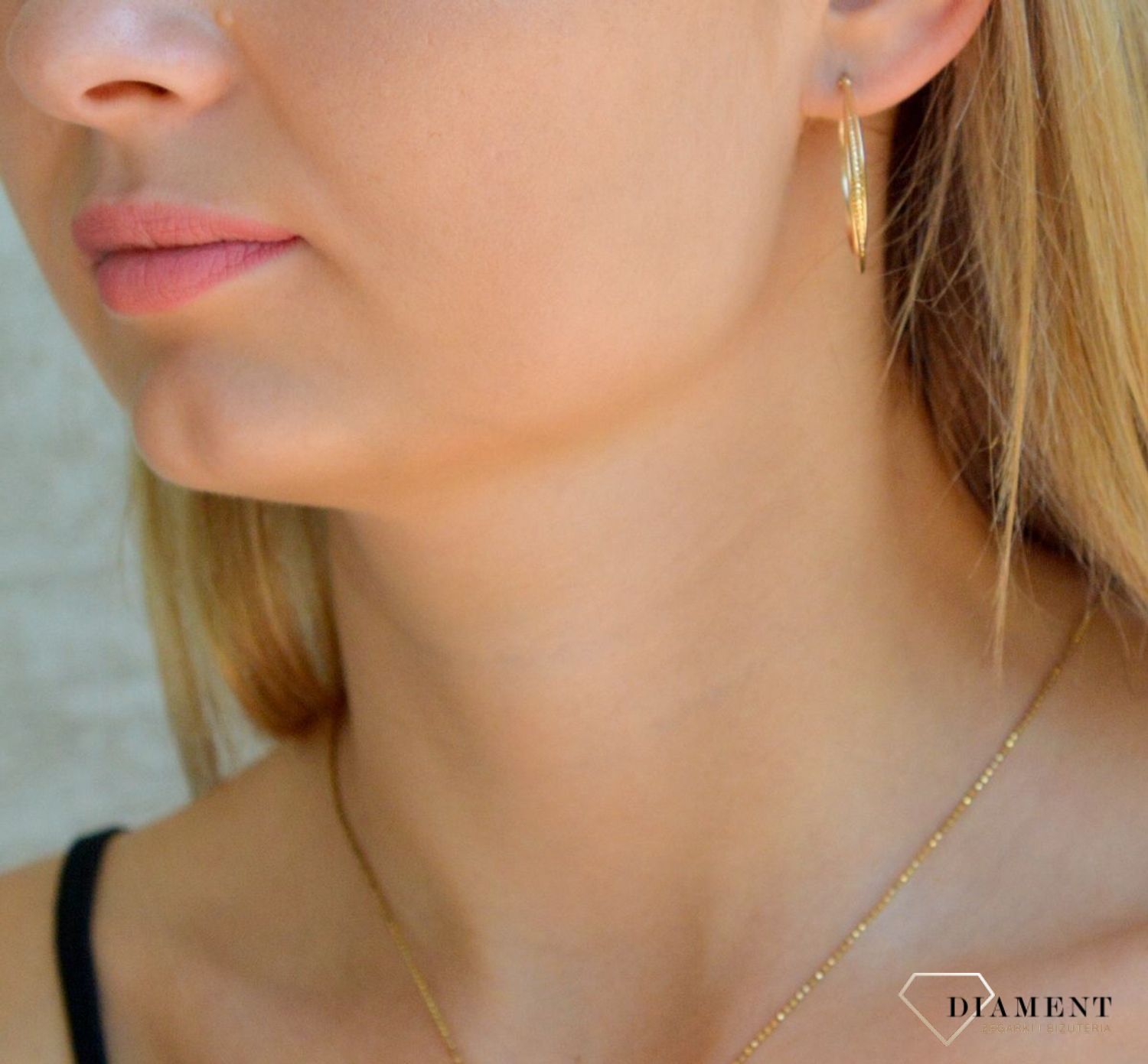 Złote kolczyki damskie 375 owalne grawerowane KL 10912 375.jpg